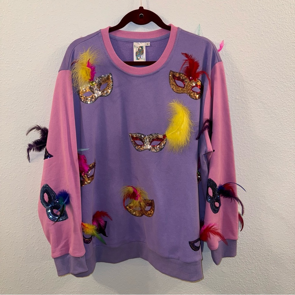 Mardi Gras Mask Feather Sweatshirt by Queen of Sparkles.
